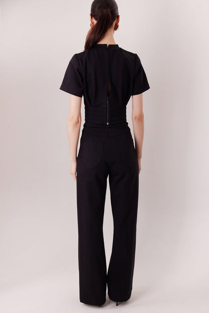 Pantalón Elton negro, vista de espalda — Sanna, colección The Gentlewoman