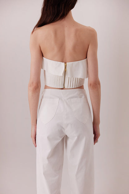 Pantalón Gemma ivory, detalle de bolsillo trasero — Sanna, colección The Gentlewoman